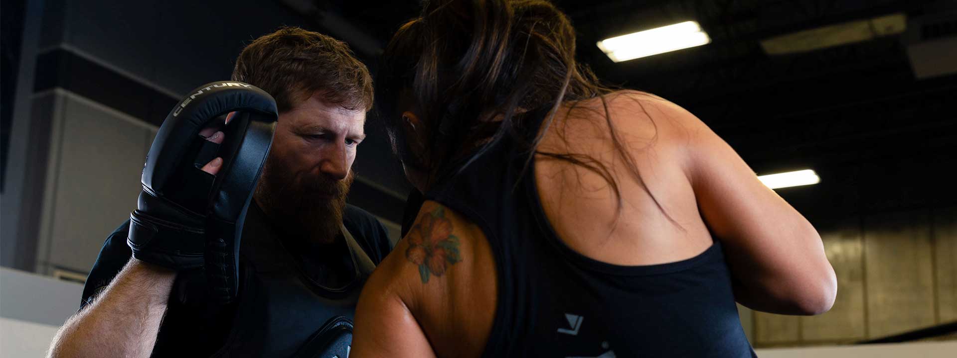 Female martial artist wearing gloves